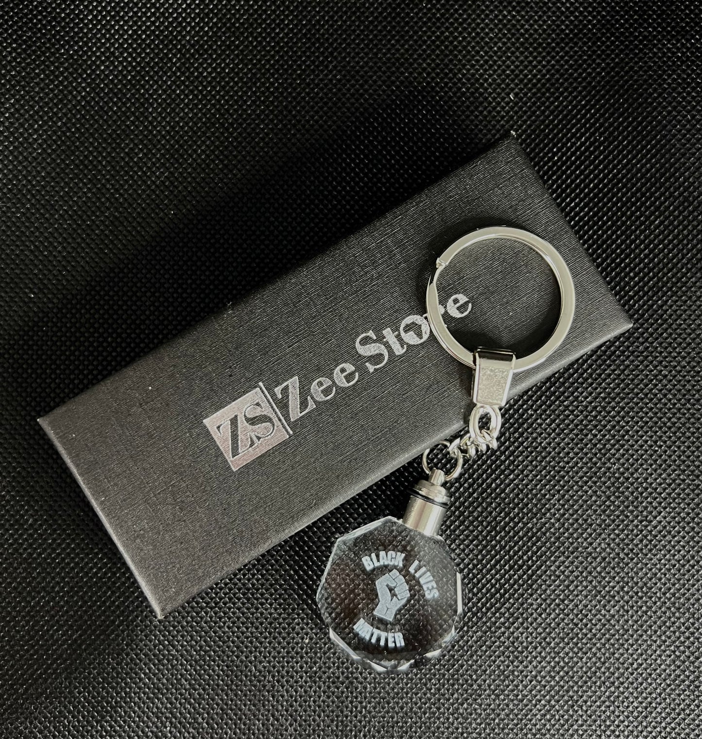 Agahu M - Black lives matter key chain made of K9 crystal with LED light
