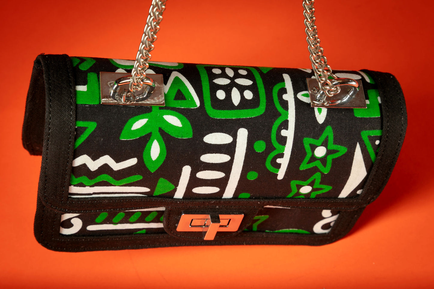 Top angle of the Axatse African print and denim handbag.