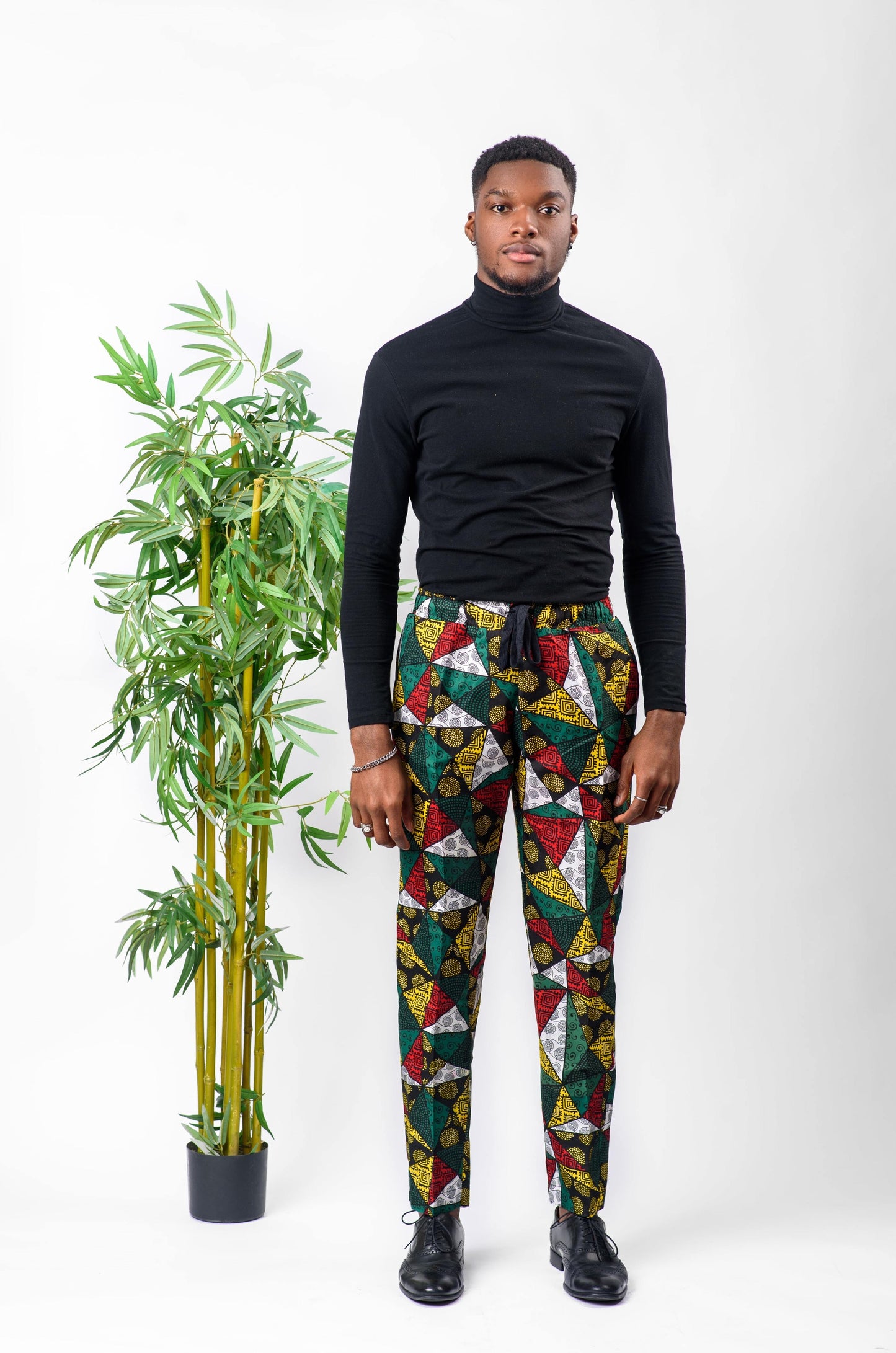 Wear your favorite tops or shirts with these simple, yet stylish African print Unisex Pants. These pants are perfect for casual wear, a night out, or even for work. These pants have a straight leg and are unisex, making them a great option for the whole family. Ankara Unisex Pants