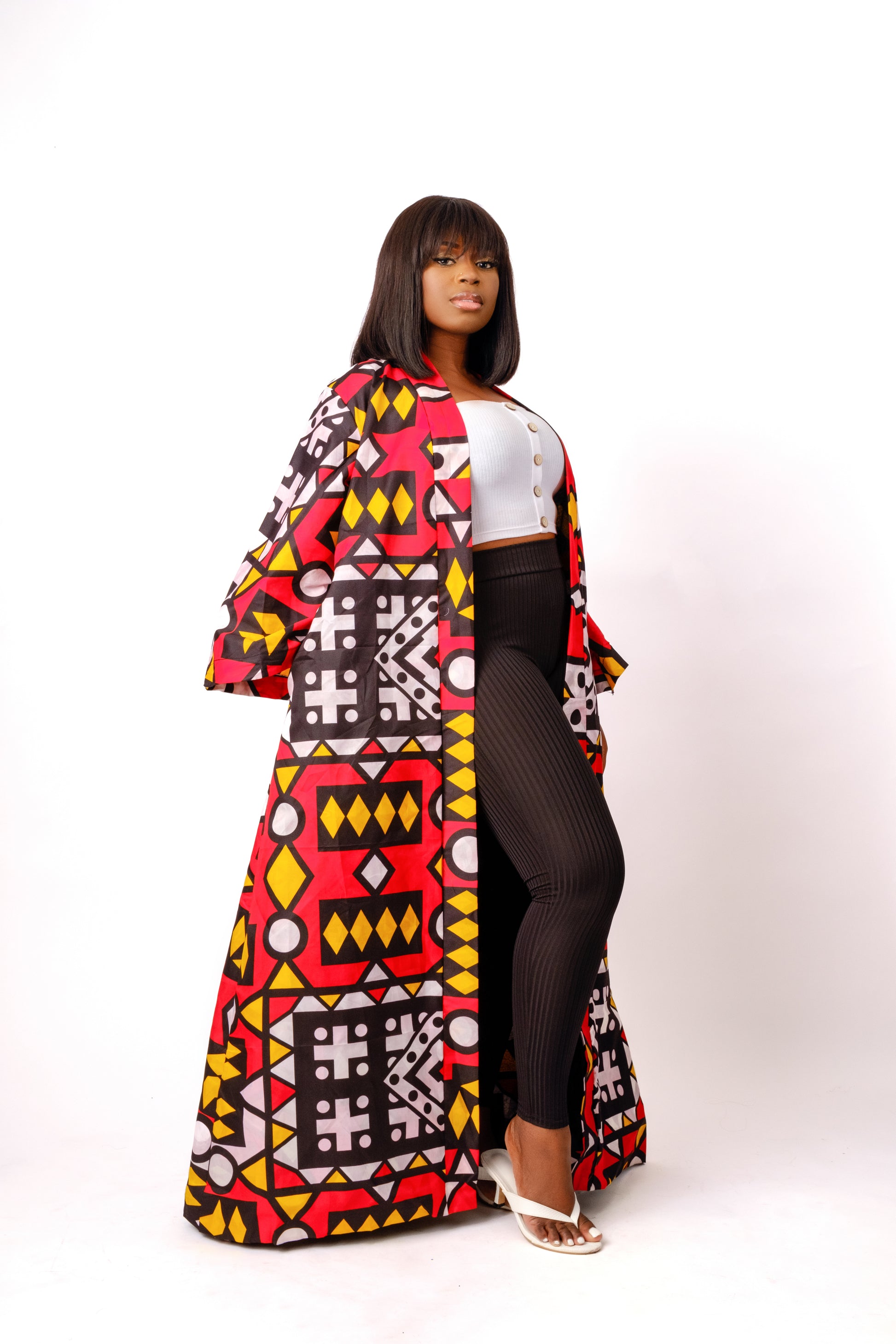 Red African print (Ankara) kimono made of a lightweight cotton material that features a mix of geometric tribal designs