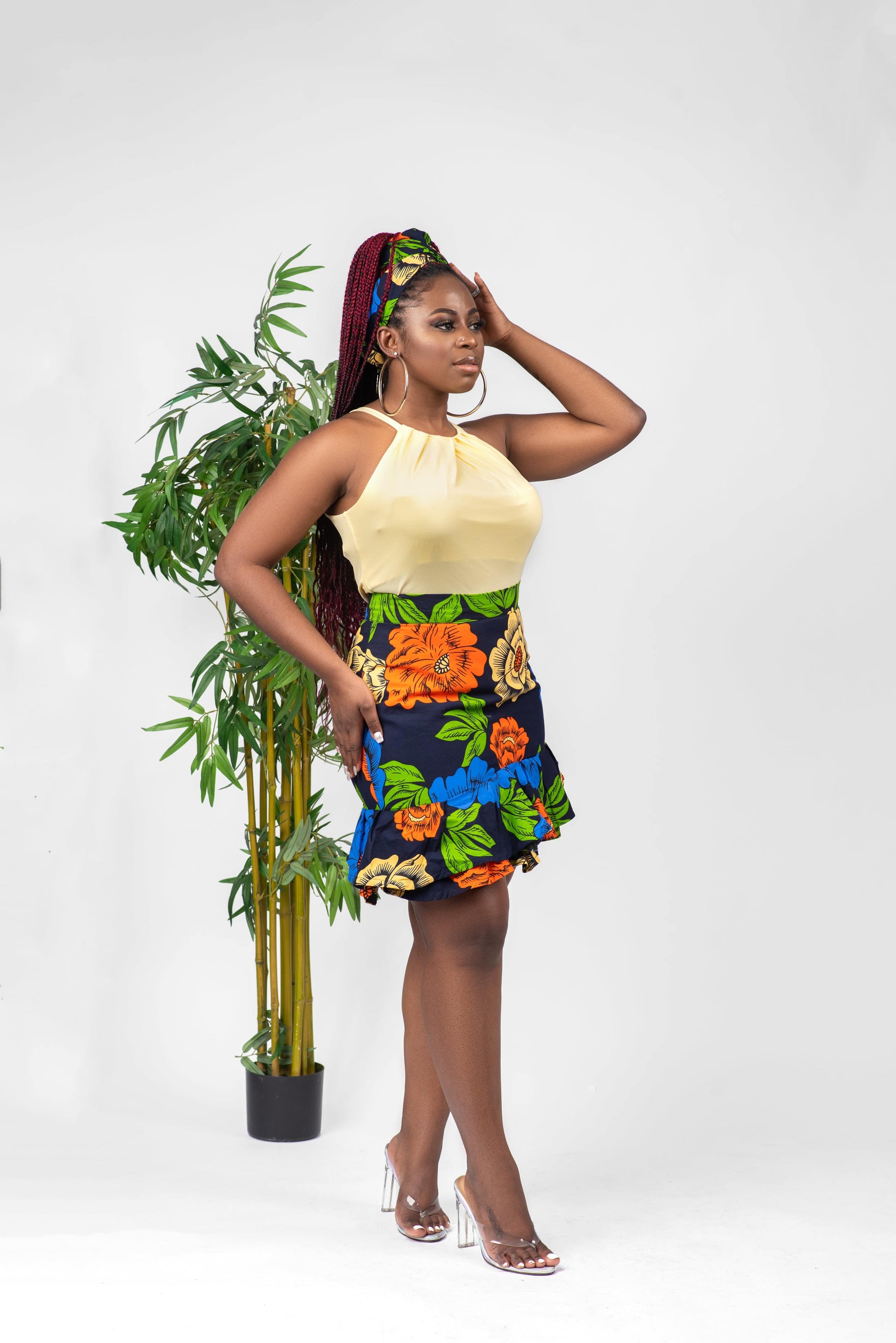 This African print skirt is Asymmetrical and features ruffles at the bottom. The asymmetrical hemline adds an element of interest, and the ruffles are fun and flirty. This skirt is perfect for women who want to stand out and be unique.   Skirt is named after the Igbo ethnic group (from Nigeria) dance style; Atilogwu.  Ankara skirt