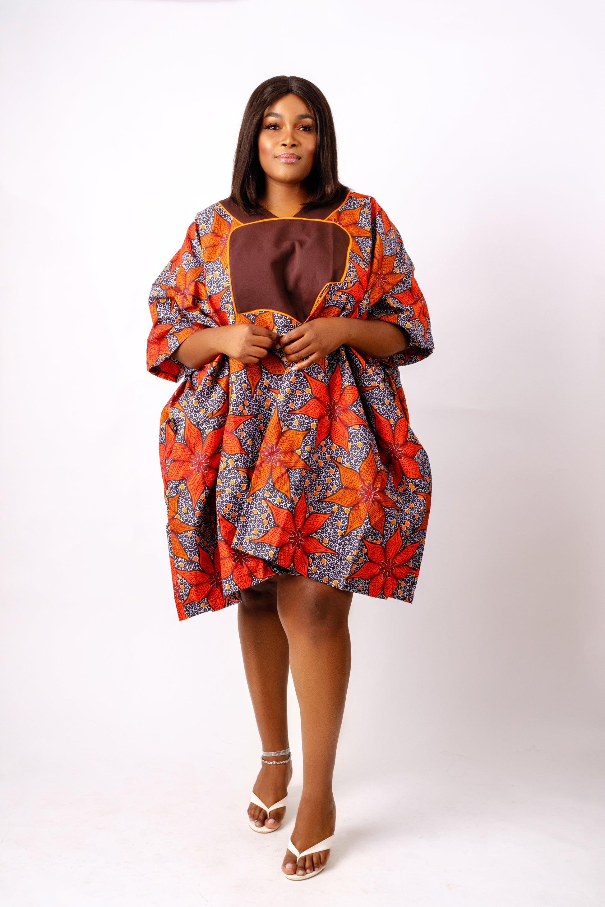 Orange ankara/african print agbada dress. Also described as Dashiki, Bubu/Boubou or Tunic style  