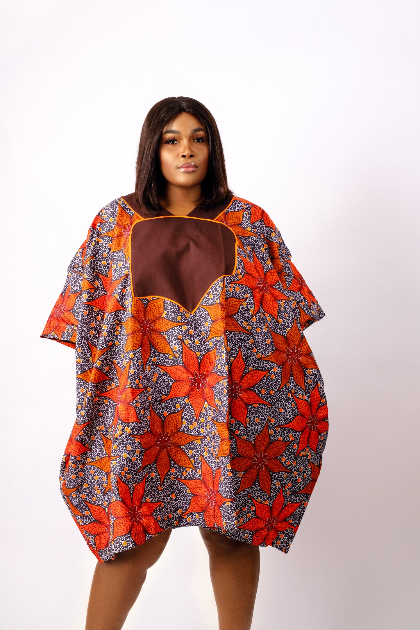 Orange ankara/african print agbada dress. Also described as Dashiki, Bubu/Boubou or Tunic style  
