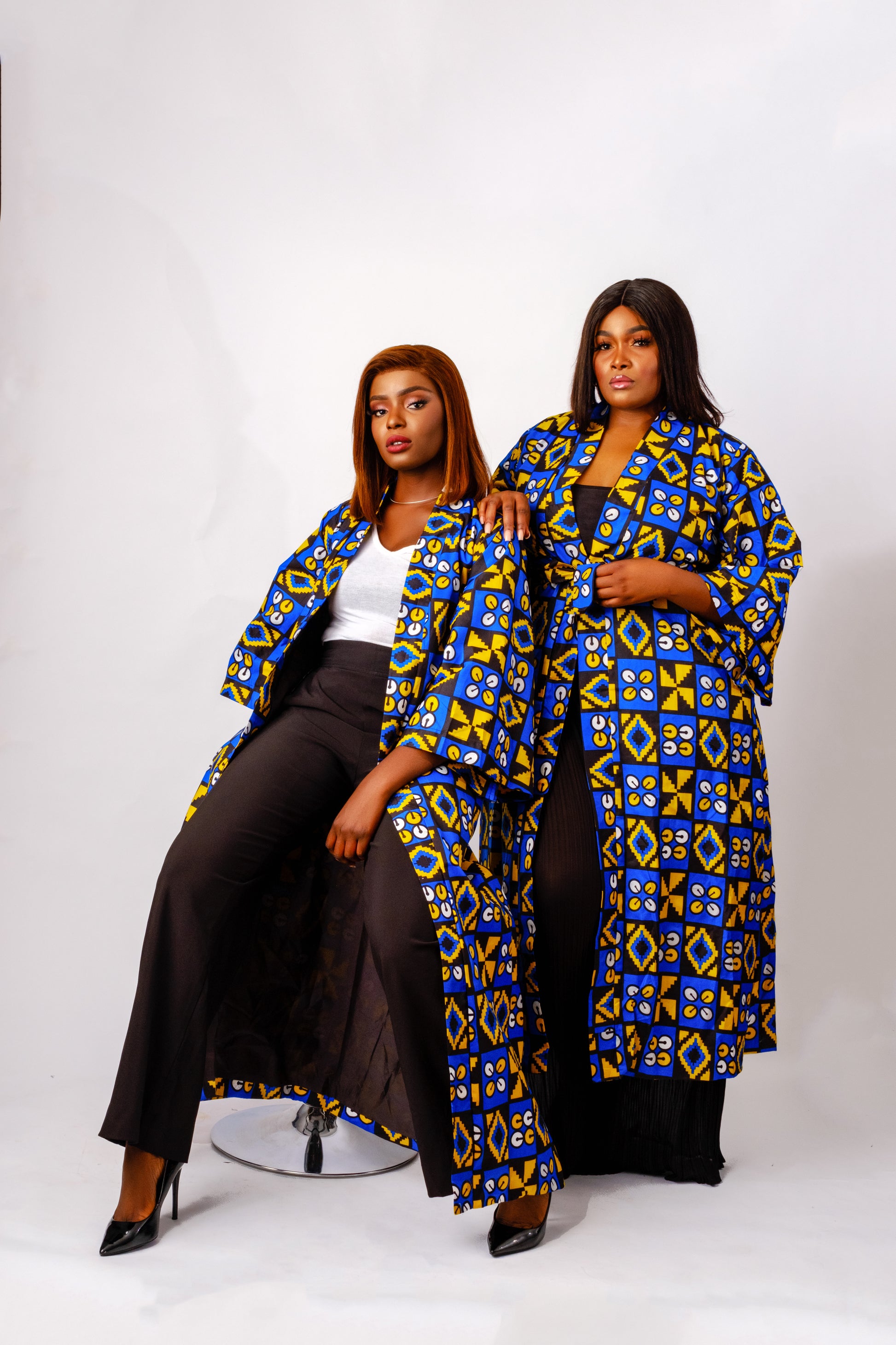 Blue African print (Ankara) kimono made of a lightweight cotton material that features a mix of geometric tribal designs