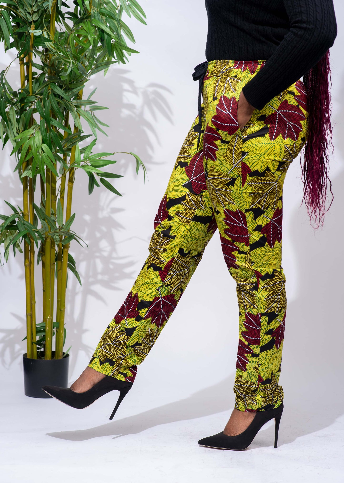 Wear your favorite tops or shirts with these simple, yet stylish African print Unisex Pants. These pants are perfect for casual wear, a night out, or even for work. These pants have a straight leg and are unisex, making them a great option for the whole family.  Pants are named after the Yoruba ethnic group (from Nigeria) dance style; Bata.     Ankara wax cotton