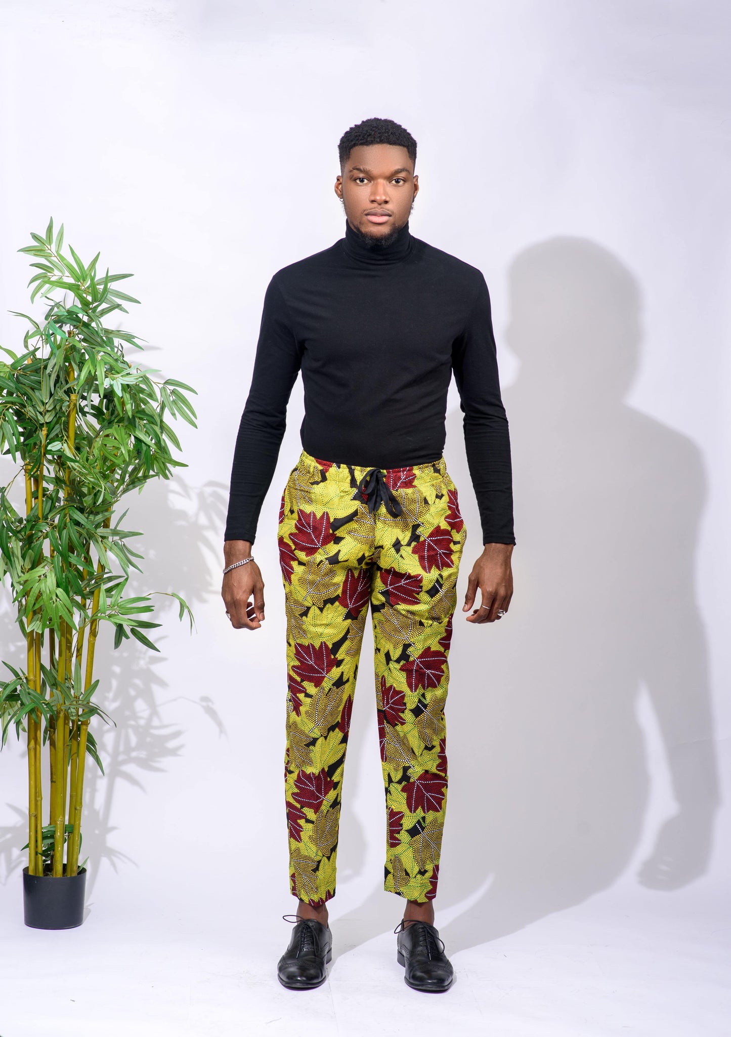 Wear your favorite tops or shirts with these simple, yet stylish African print Unisex Pants. These pants are perfect for casual wear, a night out, or even for work. These pants have a straight leg and are unisex, making them a great option for the whole family.  Pants are named after the Yoruba ethnic group (from Nigeria) dance style; Bata.     Ankara wax cotton