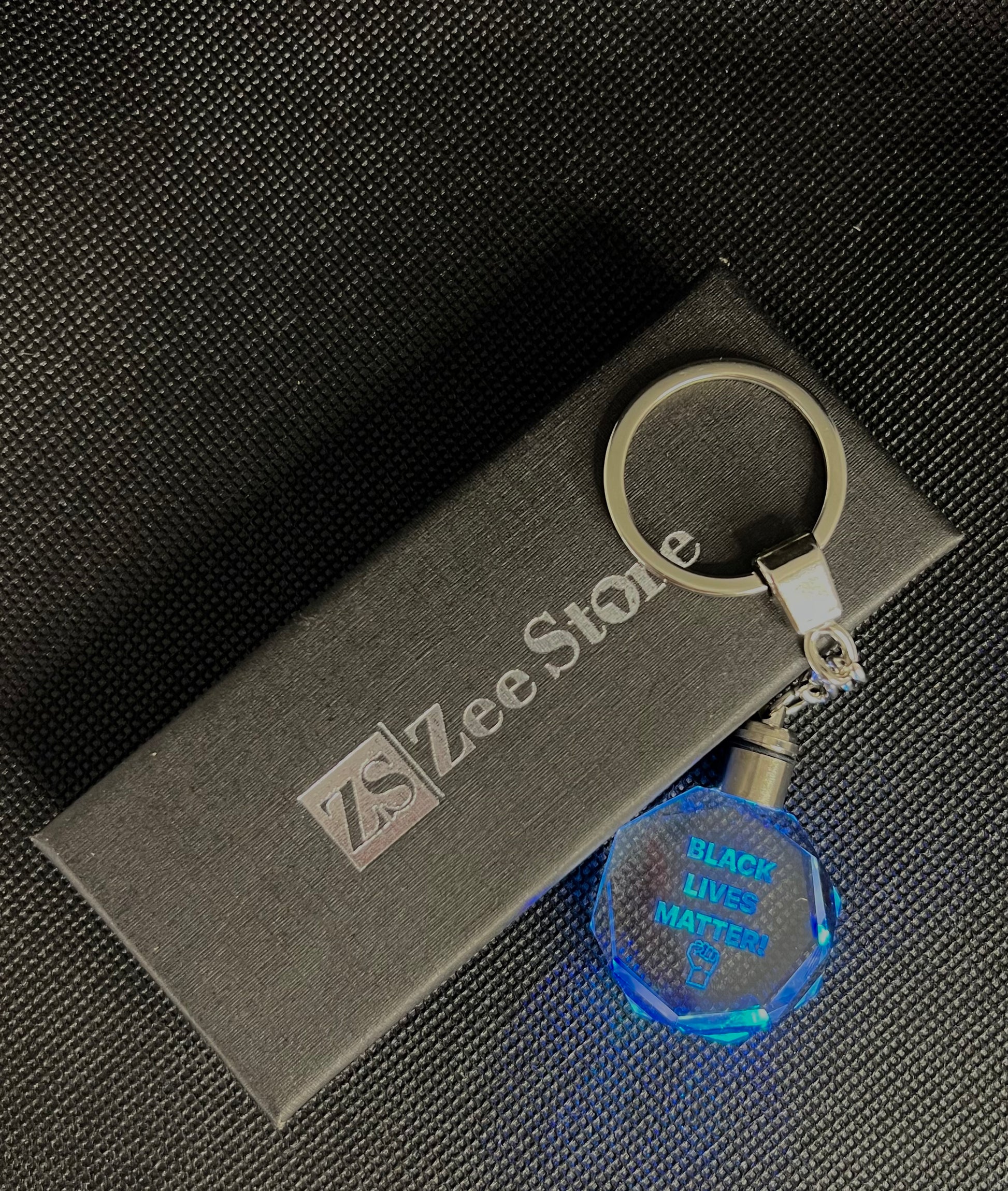 Agahu D - Black lives matter key chain made of  K9 crystal with LED light