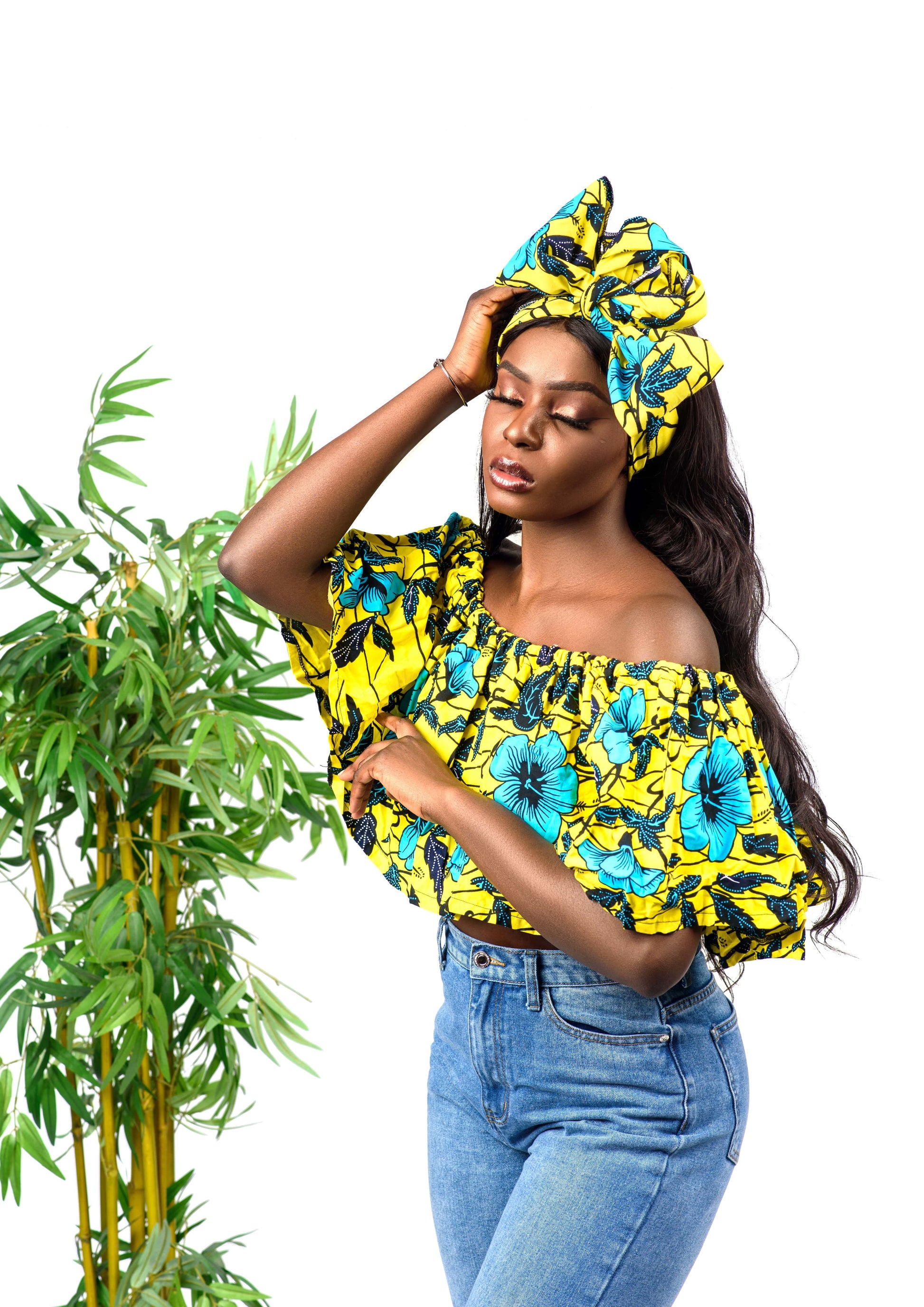 This African Print crop top is perfect for a night out on the town. The short sleeves and cropped length keep it from being too formal. The off the shoulder design allows for a more casual look, and the ruffles add a cute touch.   Top is named after the Cameroonian dance style; Makossa.   100% Ankara wax cotton 