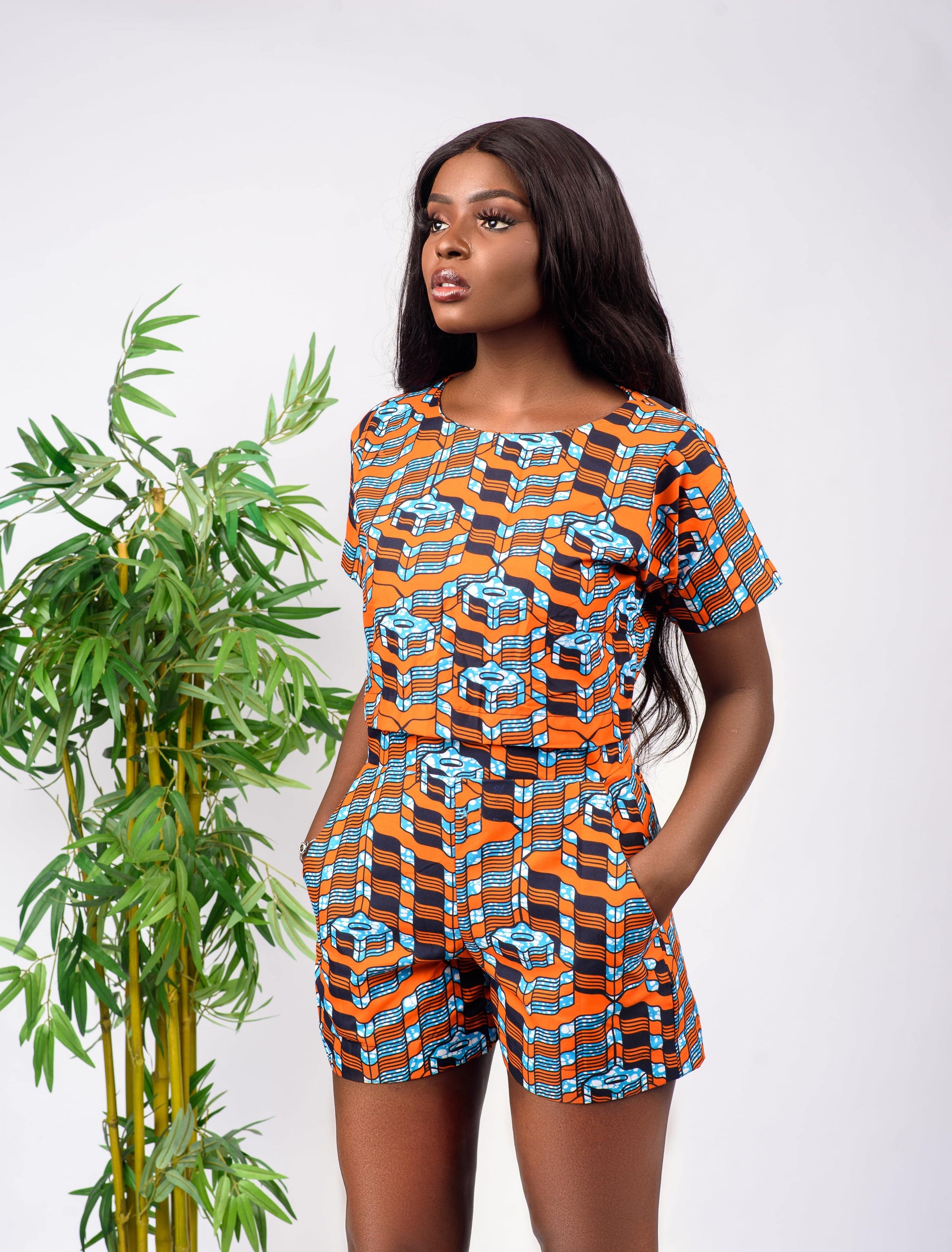 What's better than a cute African print crop top and shorts set? This outfit is perfect for the summertime and can be worn to almost any occasion. The crop top is free & comfortable and the shorts are high-waisted.   Set is named after the Igbo ethnic group (from Nigeria) dance style; Ogene   Ankara wax cotton