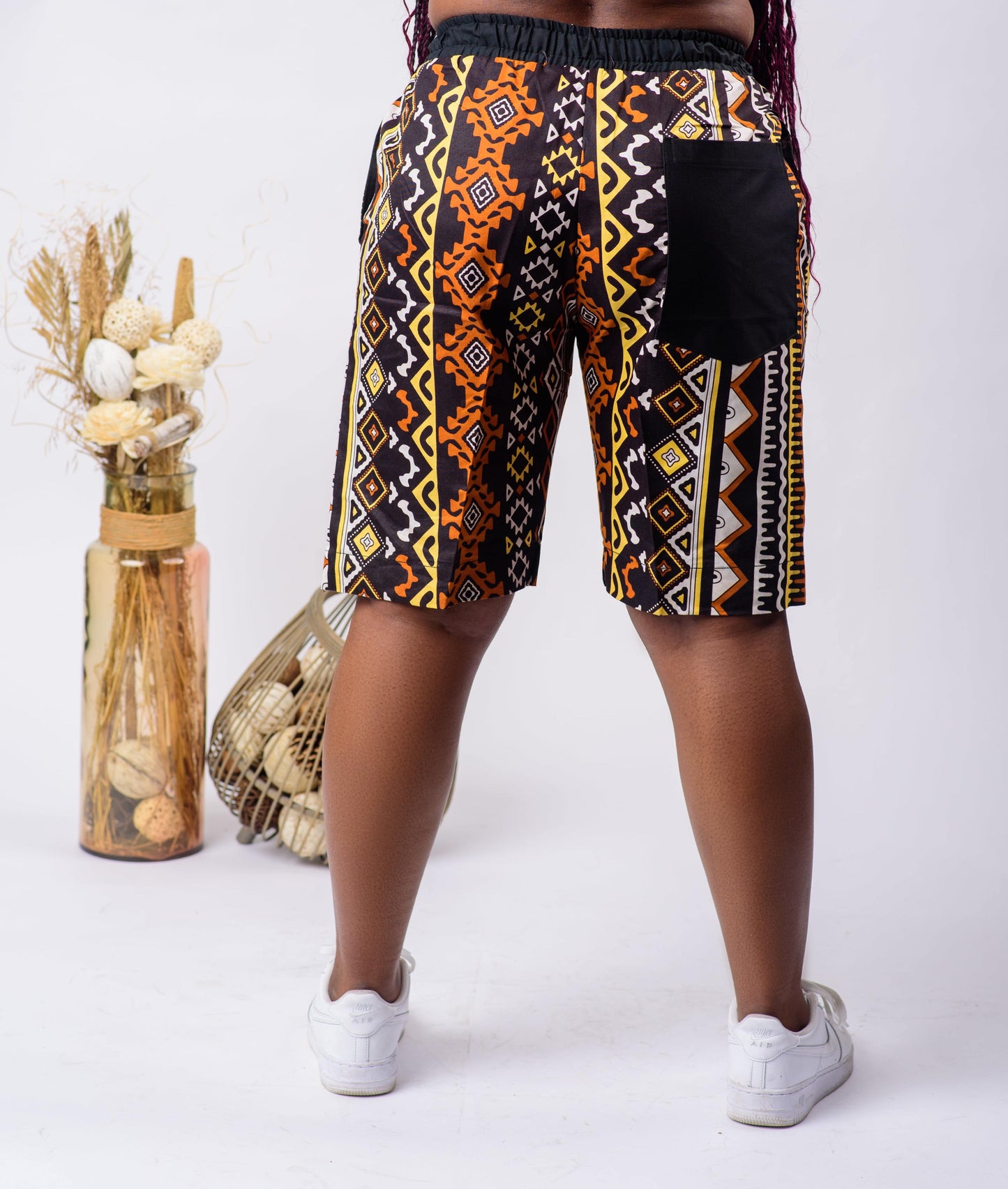 These African Print Unisex shorts are perfect for a beach day in the summer. These shorts will not only look great, but they will also feel great!  Shorts are named after the Nigerian dance style; Galala.  Ankara wax cotton