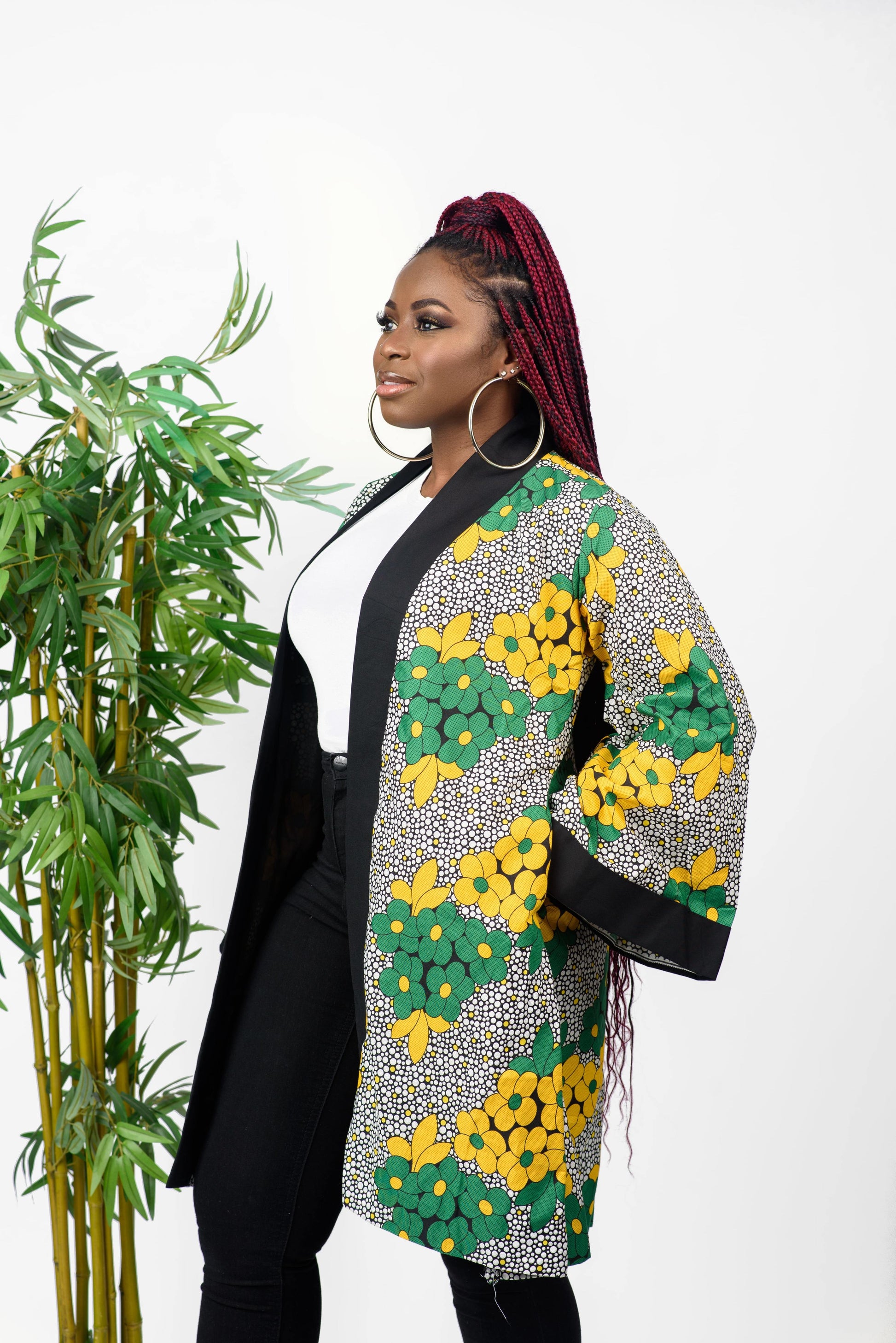 This African print kimono is a beautiful piece that can be worn as a jacket or a dress. The bold print of the kimono will get you noticed and the vibrant colors will make you stand out.  It can be paired with any outfit and can also be worn all year round.   Kimono is named after the Tiv ethnic group (from Nigeria) dance style; Swange   Ankara wax cotton